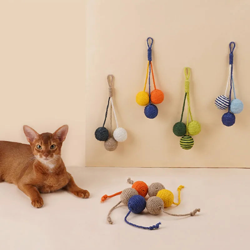 Cat teaser stick toy with catnip ball attachment, 255mm long with feather end.