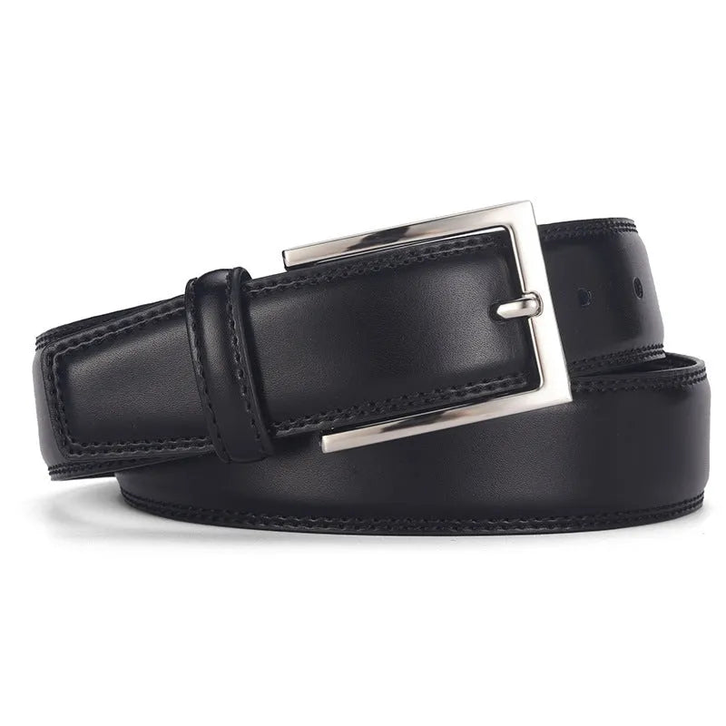 Men's classic black patent leather belt with a silver pin buckle on a flat surface.