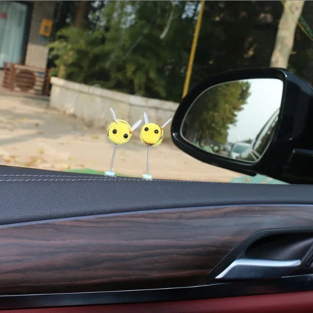 Yellow and black fur ball bee car decoration measuring 3x3 cm