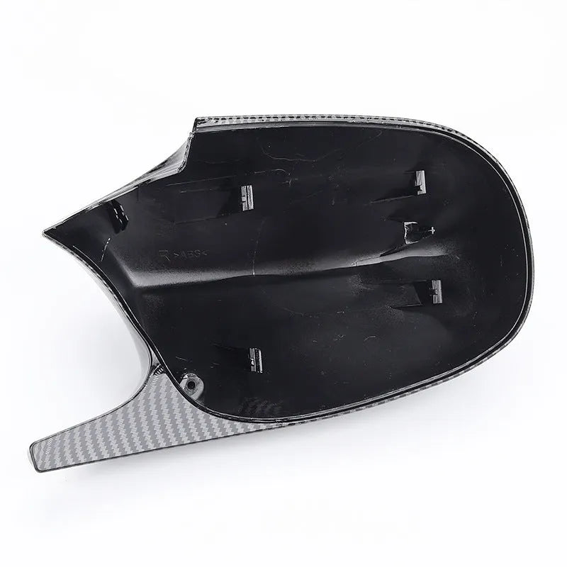 Pair of black ABS plastic rearview mirror shells for BMW 3 Series E90 car.