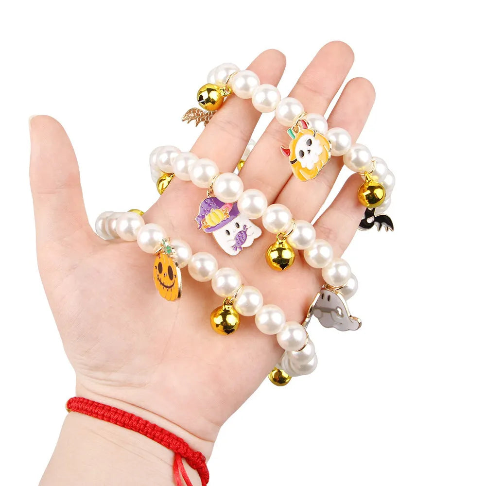 Purple Halloween cat collar with simulated pearl necklace decoration showing pumpkin designs
