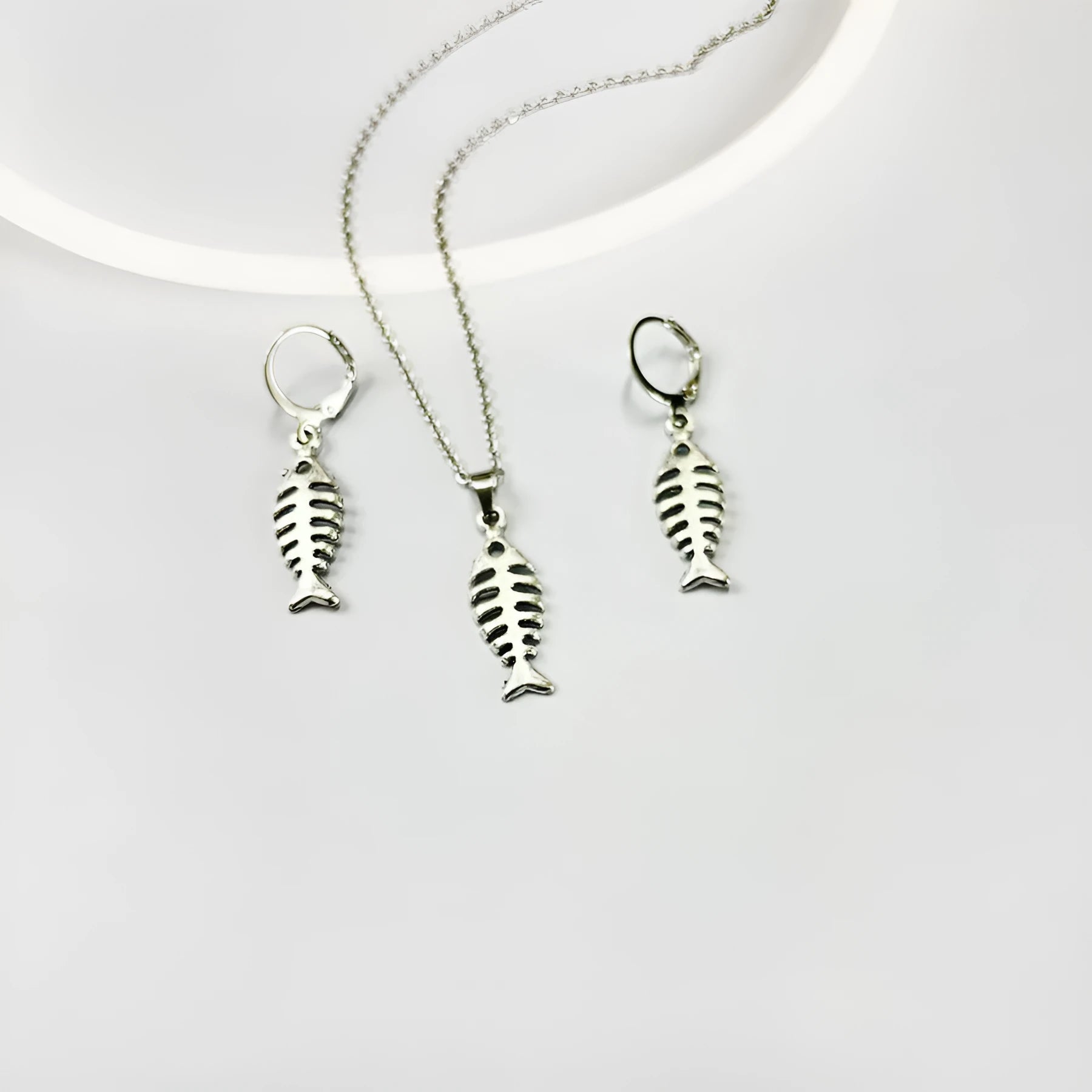 Fishbone motif pendant necklace with matching earrings on adjustable O-shaped alloy chain