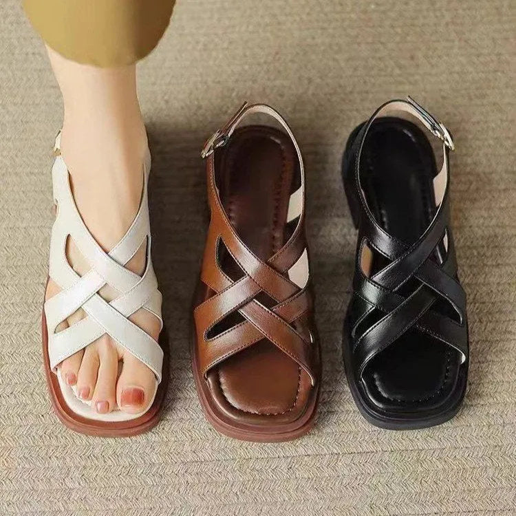 Women's patent leather square toe beach sandals in black with low heel and cross straps