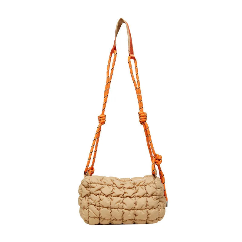 Women's lightweight nylon pillow-shaped messenger bag with a crossbody strap in six colour options.