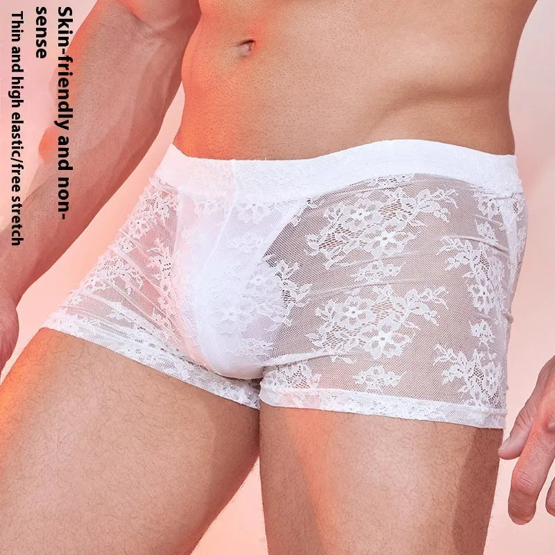 Men's black boxer briefs with white lace trim around the leg openings.