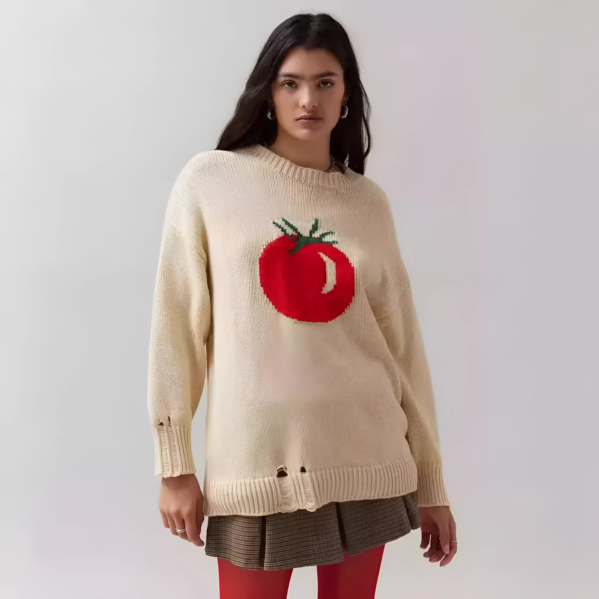 Women's milky white acrylic Jacquard pullover sweater with round neck and long sleeves on a hanger.