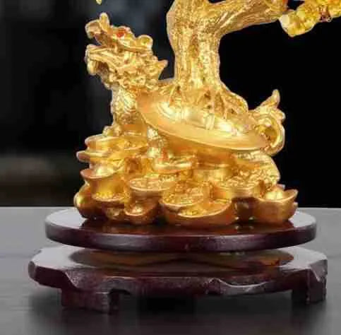 Citrine-coloured resin Feng Shui ornament with small water turtle and money tree design measuring 18x11x23cm