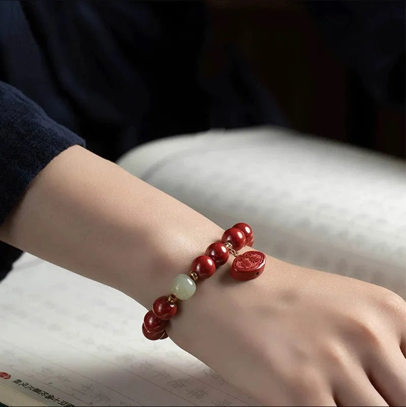 Natural cinnabar emperor sandstone bracelet with adjustable closure in 8mm or 10mm sizes