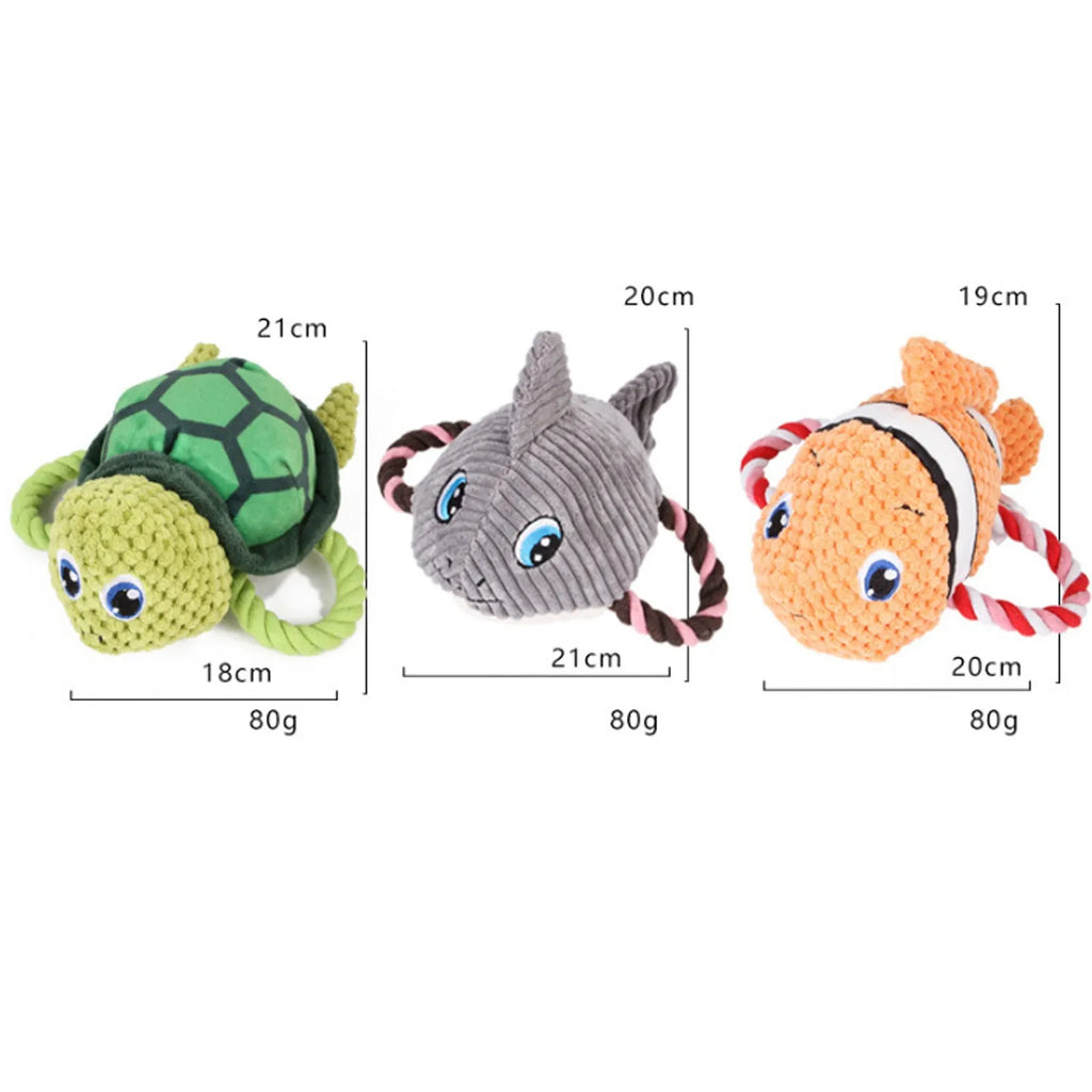 Green turtle shaped dog chewing toy with three rope knots extending from plush shell