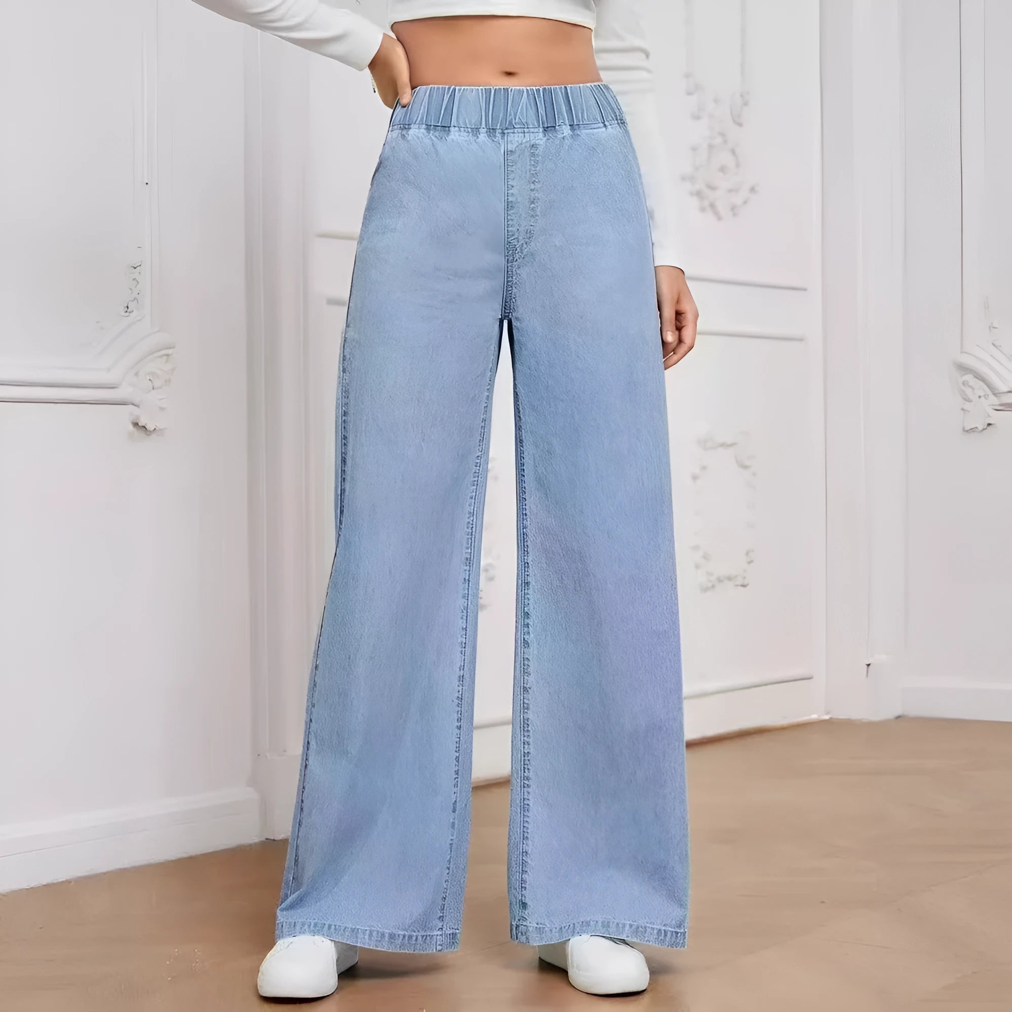 Light blue washed wide-leg women's jeans with straight leg and mid waist design