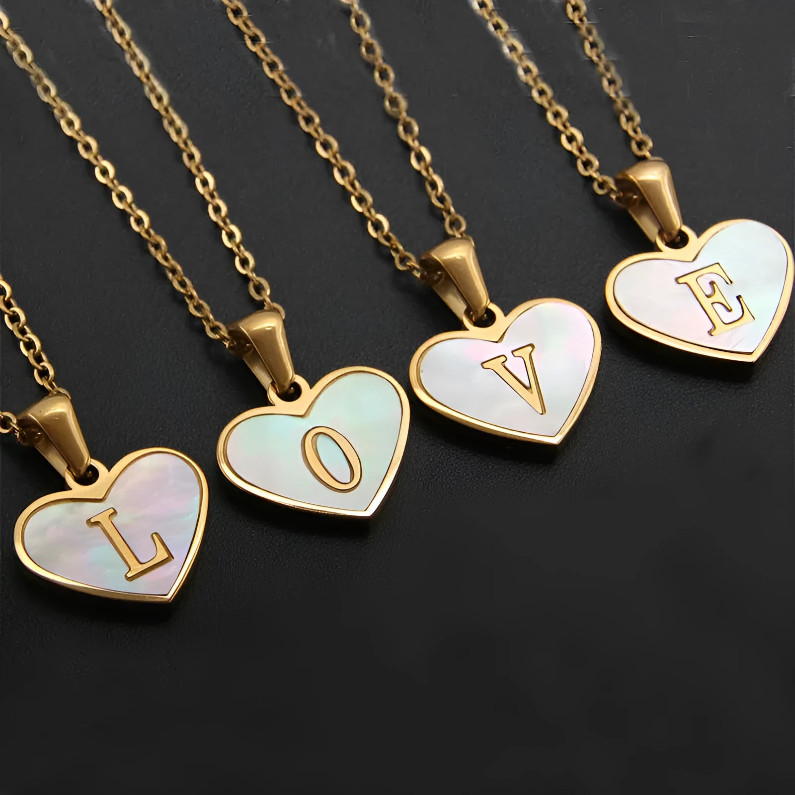 Gold plated heart necklace with white shell centre on a 45+5cm chain