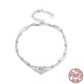 Sweet girlish style 925 sterling silver bracelet with a small heart-shaped charm on a chain.