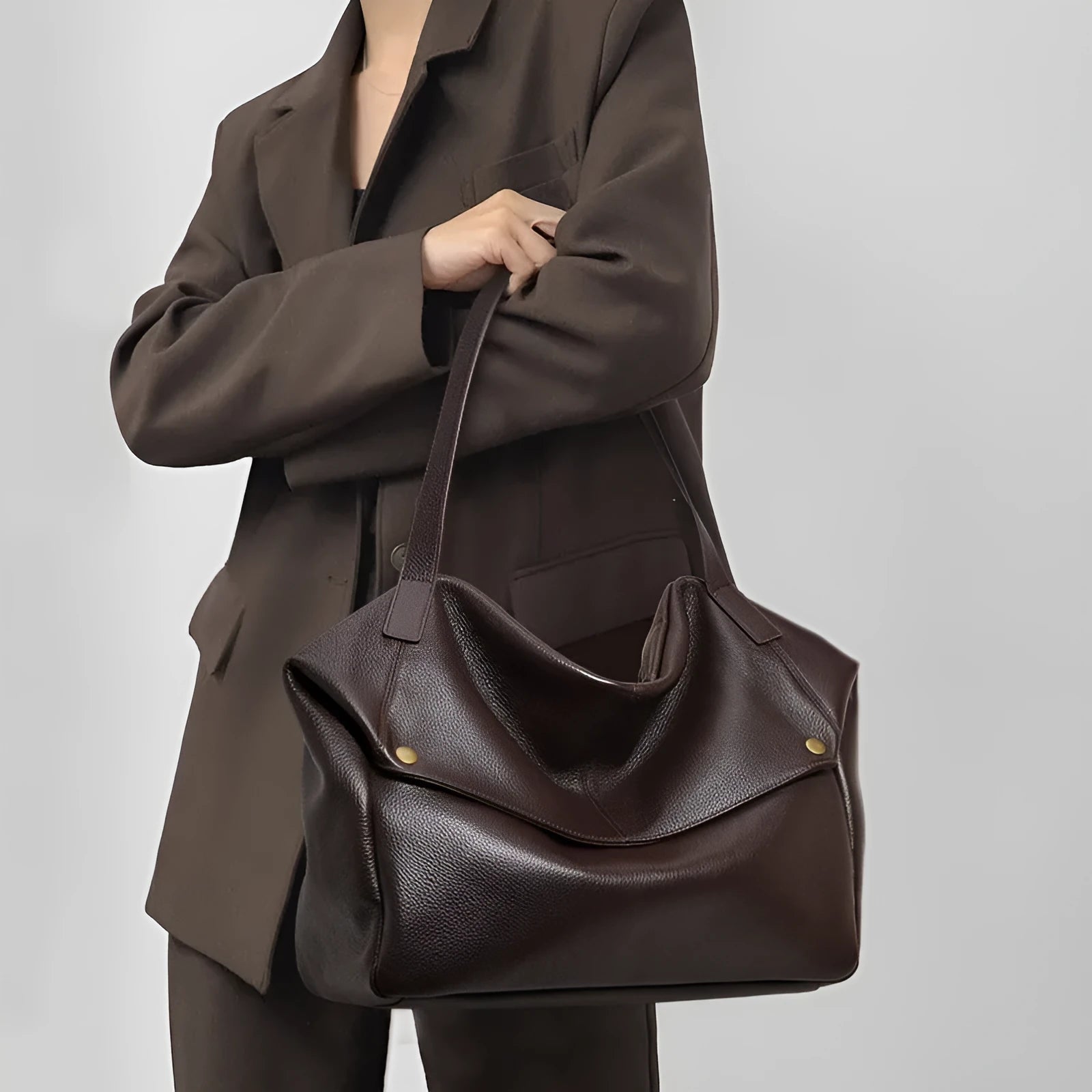 Brown genuine leather women's commuter shoulder bag with square shape and shoulder strap