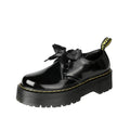 Women's black lace-up shoes with thick TPR sole, ribbon and cross strap details on superfine fibre upper.