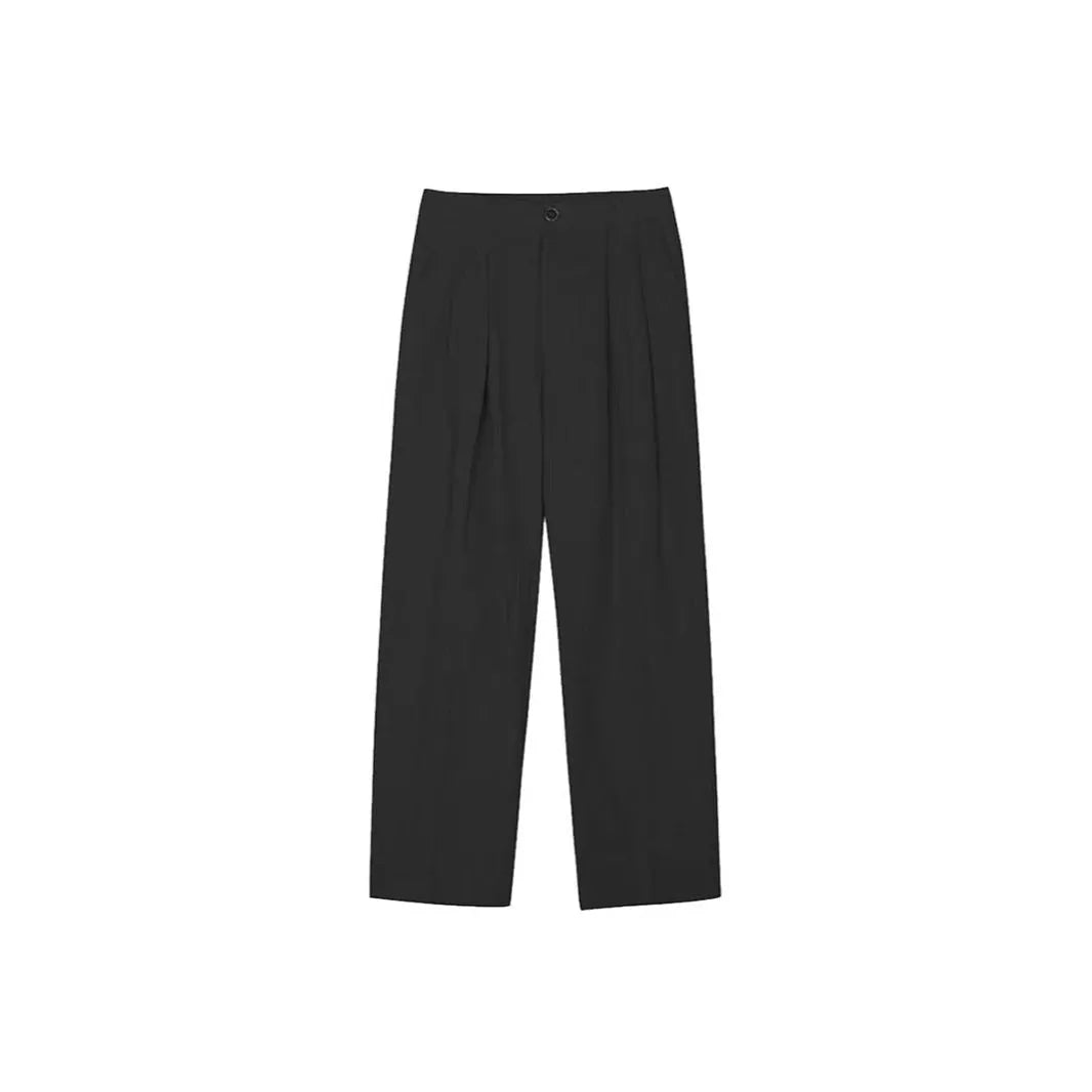 Men's loose lightweight cotton linen trousers in apricot colour showing wide-leg Korean style design