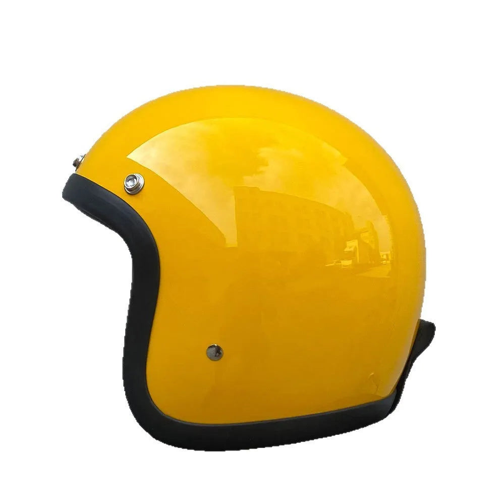 Retro-style fibreglass motorcycle half helmet shown in cement grey colour option