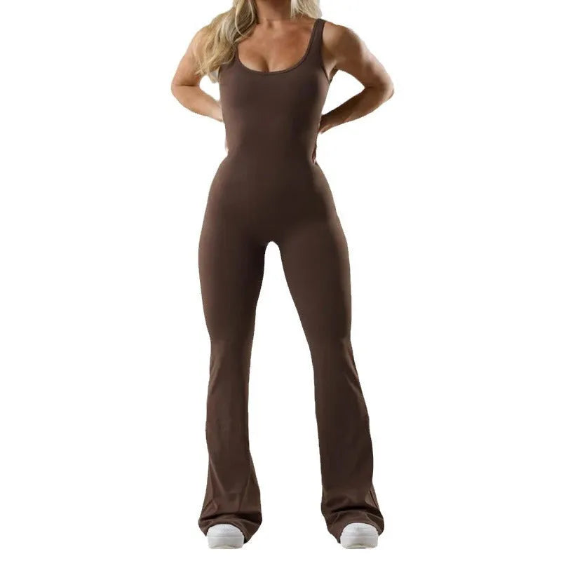 Women's black seamless hollow out yoga bodysuit with mid waist and trousers length.