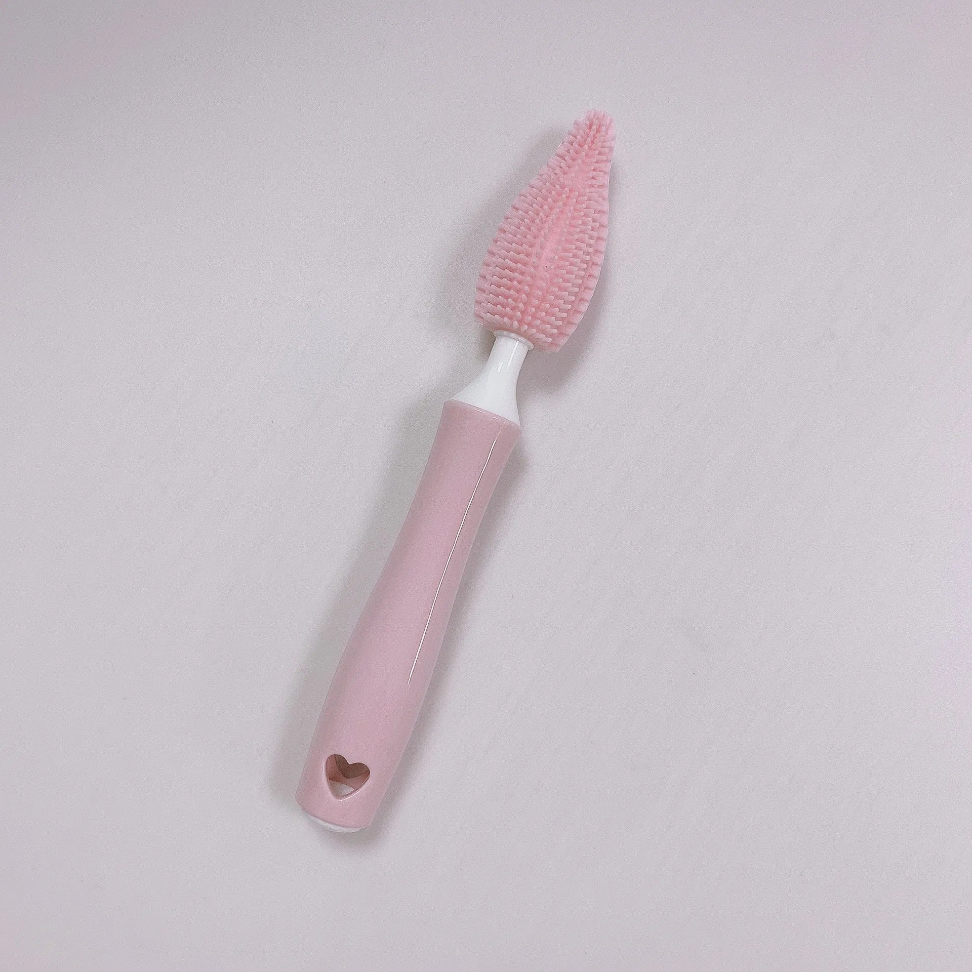 Silicone baby bottle brush and straw cleaning set in pink, blue, and yellow colour options