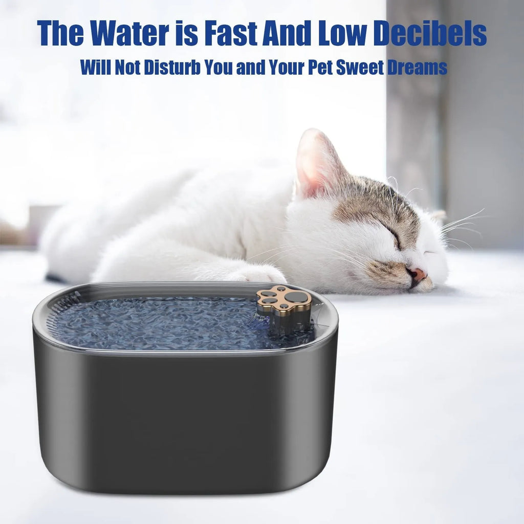 Blue automatic pet water fountain with filter on a floor next to a cat