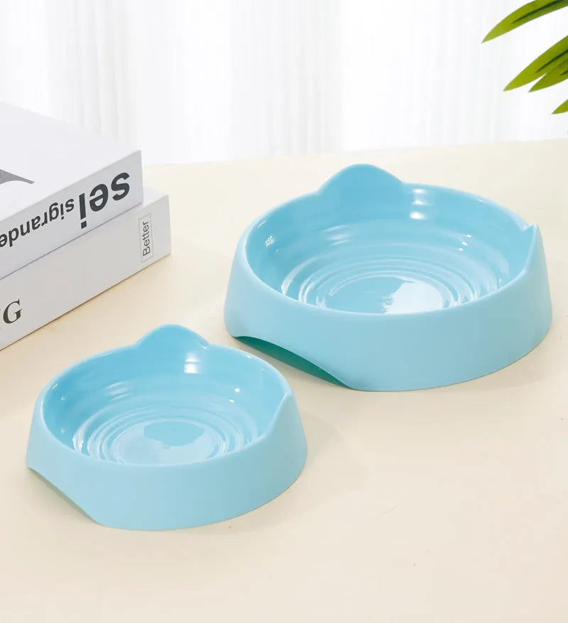 Blue ceramic dog slow feeder bowl with maze design and raised cups for slowing down fast eating.