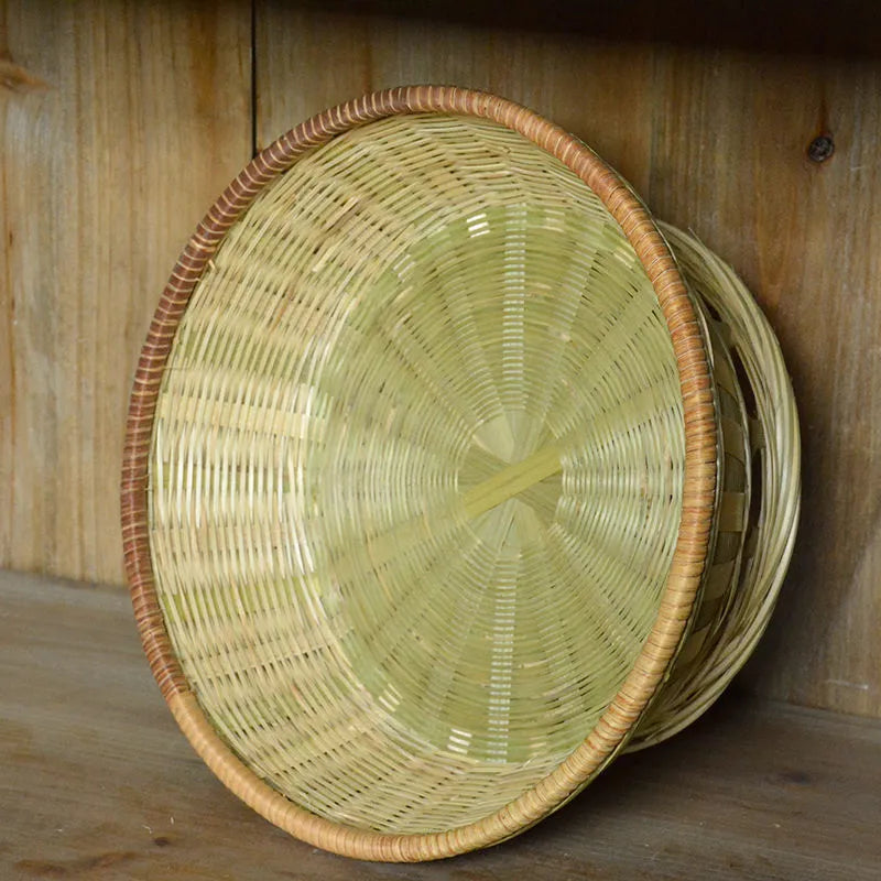 Handmade woven bamboo storage basket in three different sizes for household organisation