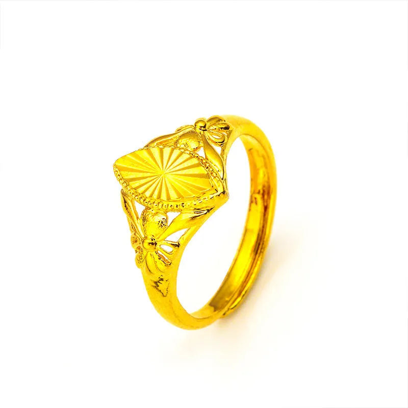 Alluvial gold geometric ring with textured open diamond flower design on brass base