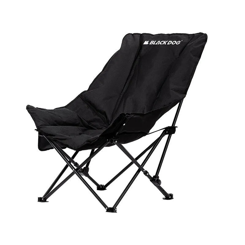 Night Black Oxford cloth folding moon chair in a reclined position on grass.
