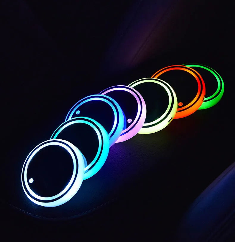 LED light-up car coaster showing seven colour options in automotive cup holder