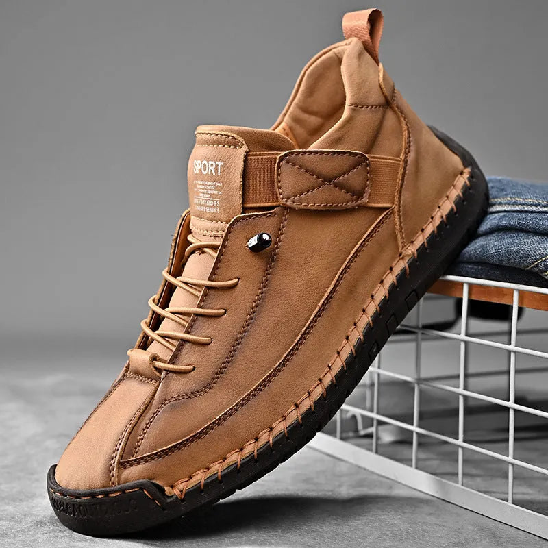Men's mid-calf martin boots in khaki with visible tooling stitching and an elastic band closure.