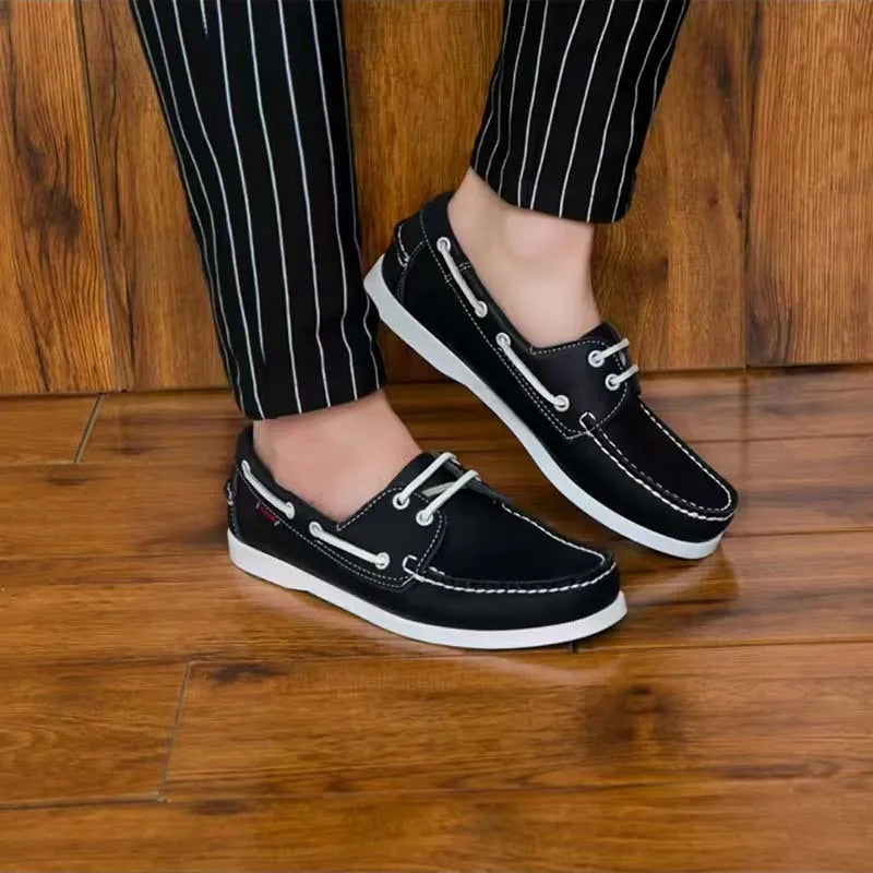 Men's British-style casual shoe with artificial PU upper, flat heel and round toe in solid colour.