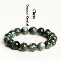 Natural green dragon crystal bracelet with 8-9mm round beads and Ruyi design on wrist.
