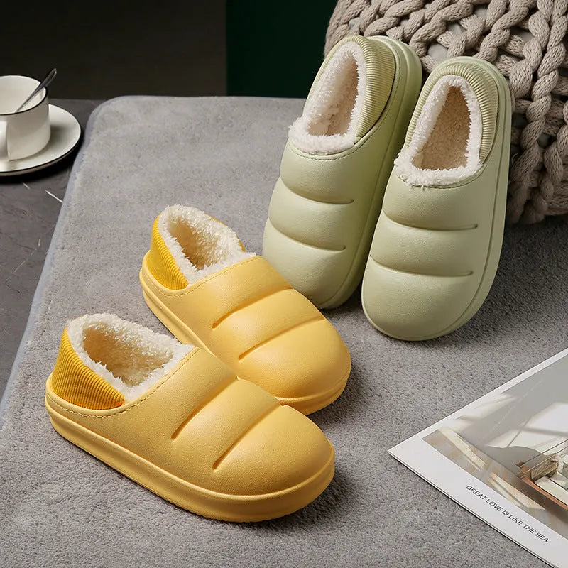 Waterproof EVA couple slippers in various colours showing hollow design and flat non-slip sole.