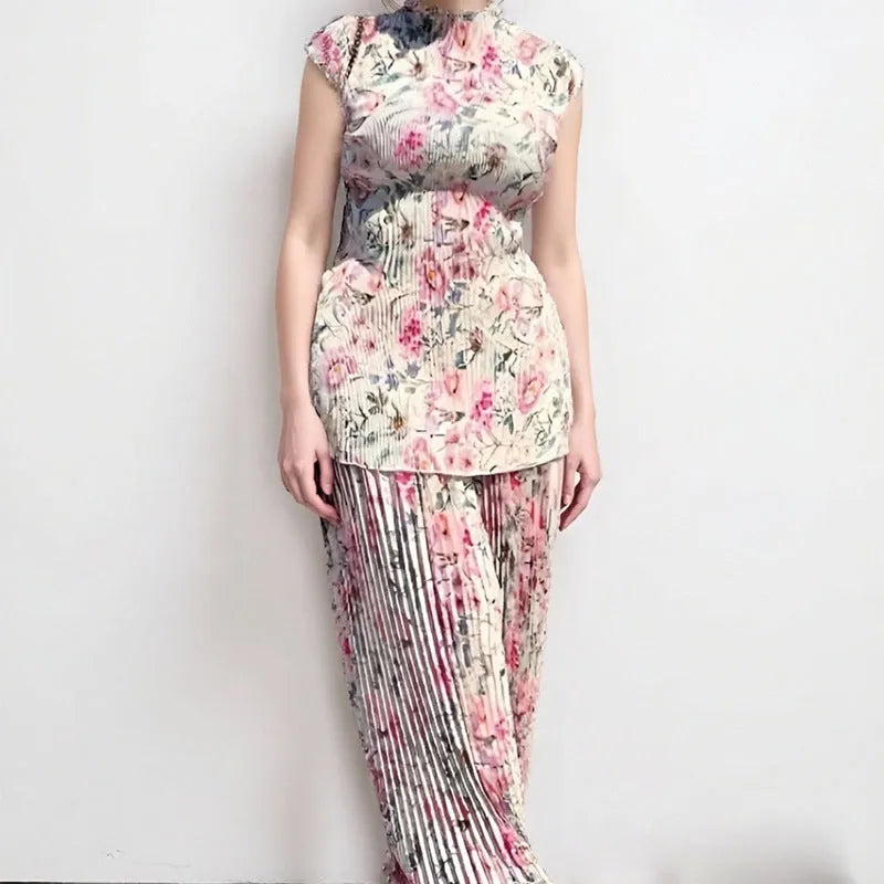 Long sleeve printed high-waist chiffon dress set with matching top and skirt on a model.