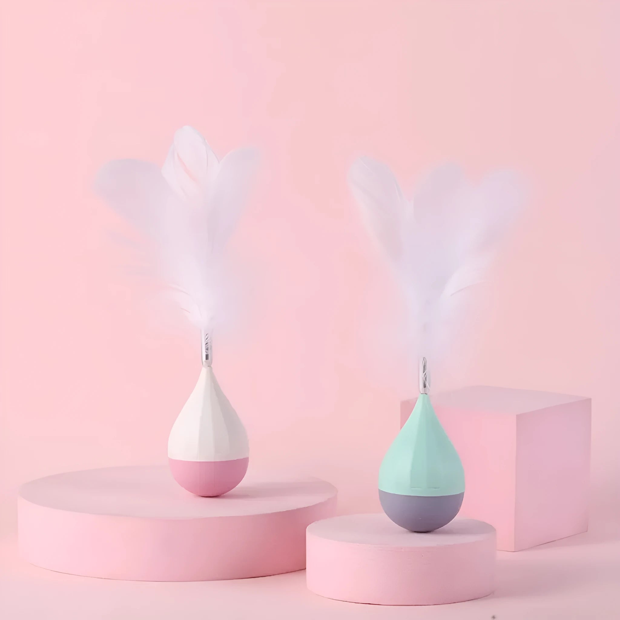 Green and pink feather tumbler cat toy with aluminium alloy frame and self-healing design