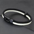 Black and white handmade woven hand strap with Milan rope alloy construction in 19cm, 21cm, or 23cm sizes.