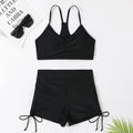Women's high waist split bikini swimsuit in violet and black colours with sleeveless briefs style