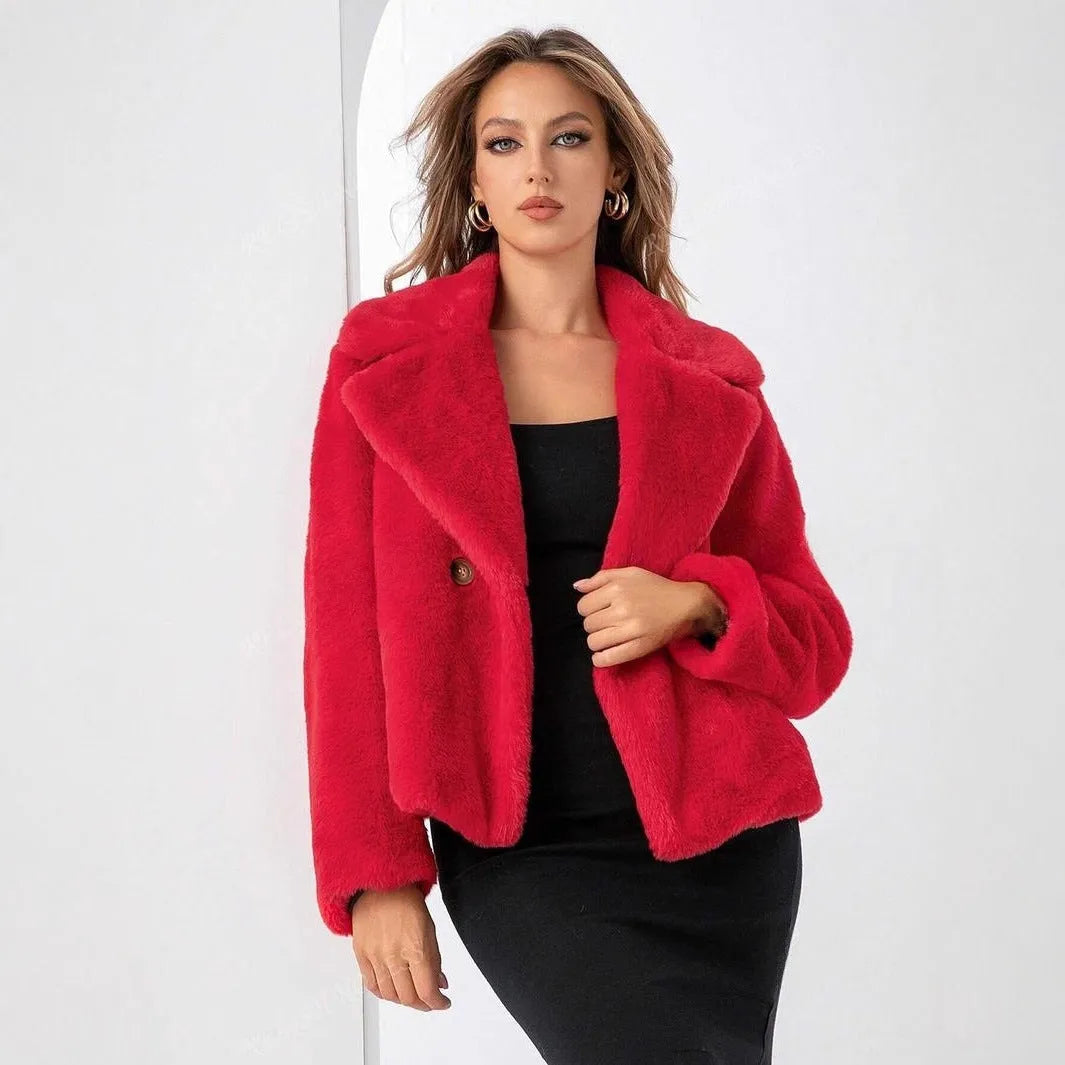 Women's loose-fit short faux fur coat in artificial fabric, shown in rose red colour with regular sleeves.
